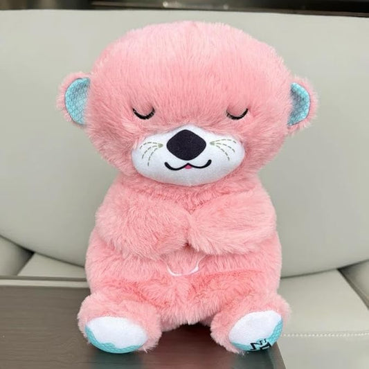 Peluche relajante para bebé que simula respiración ( nutria rosa )