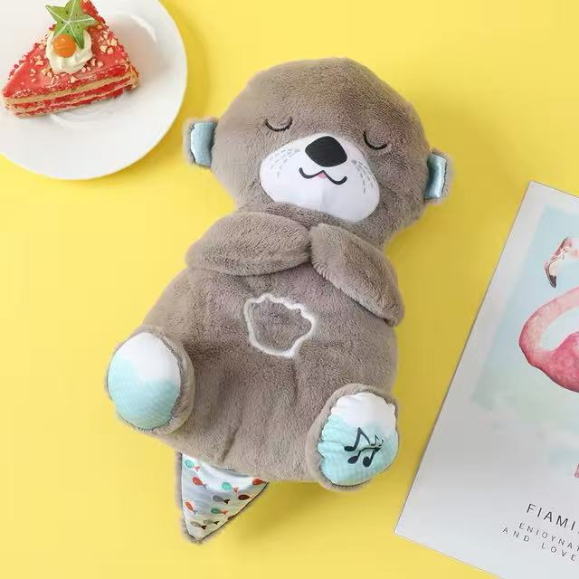 Peluche relajante para bebé que simula respiracion ( nutria marron )